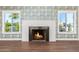 Bright living room with fireplace and hardwood floors at 1345 W Edgemont Ave, Phoenix, AZ 85007