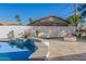 Inviting swimming pool with a built-in fire pit at 1345 W Edgemont Ave, Phoenix, AZ 85007