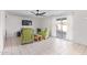 Relaxing living room with tiled floor and sliding glass doors at 15409 N 61St Ave, Glendale, AZ 85306