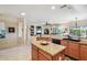 Spacious kitchen with an island and granite countertops at 19330 N Hunters Run, Surprise, AZ 85387