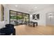 Open concept dining room with sliding doors leading to a backyard oasis at 21057 N 74Th Way, Scottsdale, AZ 85255