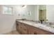 Bathroom boasts double vanity with granite countertop at 36469 N 32Nd Ave, Phoenix, AZ 85086