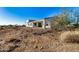 View of home's exterior and surrounding desert landscape at 36469 N 32Nd Ave, Phoenix, AZ 85086