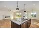 Modern kitchen with granite island, stainless steel appliances, and wood cabinets at 36469 N 32Nd Ave, Phoenix, AZ 85086