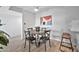 Cozy dining area with a round wooden table and four black chairs at 4141 N 31St St # 414, Phoenix, AZ 85016