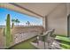Relaxing patio featuring two chairs and a small table at 4141 N 31St St # 414, Phoenix, AZ 85016