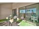 Relaxing patio with wicker chairs and access to interior at 4141 N 31St St # 414, Phoenix, AZ 85016