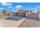 Single-story home with two-car garage and gated driveway at 4747 E Covina St, Mesa, AZ 85205