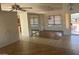 Bright dining area with tile flooring and access to kitchen at 9190 W Wenden Dr, Arizona City, AZ 85123