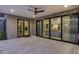 Covered patio with multiple sliding glass doors at 1312 E Coyote Pass -- # 186, Carefree, AZ 85377