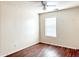 Bright bedroom with wood flooring and ceiling fan at 2526 W Woburn Ln, Phoenix, AZ 85085