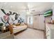 Bedroom with daybed, cactus mural and barn door at 4015 E Catalina Dr, Phoenix, AZ 85018