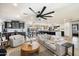 Open concept kitchen with island, stainless steel appliances, and marble countertops at 4015 E Catalina Dr, Phoenix, AZ 85018