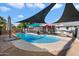 Inviting kidney-shaped pool with brick coping at 4015 E Catalina Dr, Phoenix, AZ 85018