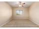 Simple bedroom with carpet and window coverings at 45335 W Rhea Rd, Maricopa, AZ 85139