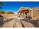 Large backyard with gravel landscaping and covered patio at 5706 S 33Rd Dr, Phoenix, AZ 85041