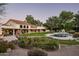 Expansive backyard with pool, patio, and lush landscaping at 6301 E Huntress Dr, Paradise Valley, AZ 85253