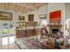 Home bar with wood cabinetry and views to backyard at 6301 E Huntress Dr, Paradise Valley, AZ 85253