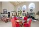 Bright living area with high ceilings, fireplace and views to backyard at 6301 E Huntress Dr, Paradise Valley, AZ 85253