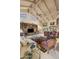 Spacious living room with high ceilings, built-ins, and fireplace at 6301 E Huntress Dr, Paradise Valley, AZ 85253