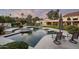 Inviting pool area with surrounding landscaping and patio furniture at 6301 E Huntress Dr, Paradise Valley, AZ 85253