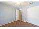 Bedroom with ceiling fan and sliding door closet at 680 E Gail Dr, Chandler, AZ 85225