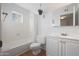 Clean bathroom with white vanity, toilet, and bathtub at 10015 N 14Th St # 7, Phoenix, AZ 85020