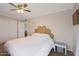 Bright bedroom with double bed, ceiling fan, and ample closet space at 10015 N 14Th St # 7, Phoenix, AZ 85020