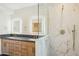 Spa-like bathroom with double vanity, marble shower, and modern design at 10587 E Caron St, Scottsdale, AZ 85258