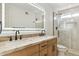 Modern bathroom with double vanity and walk-in shower at 10587 E Caron St, Scottsdale, AZ 85258