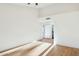 Spacious bedroom with hardwood floors and access to bathroom at 10587 E Caron St, Scottsdale, AZ 85258