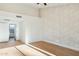 Bright bedroom with hardwood floors and access to bathroom at 10587 E Caron St, Scottsdale, AZ 85258