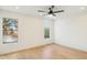 Spacious bedroom with hardwood floors and large windows at 10587 E Caron St, Scottsdale, AZ 85258