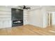 Gathering room with a modern fireplace and built-in shelves at 10587 E Caron St, Scottsdale, AZ 85258
