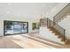 Open living space with sliding doors to backyard pool at 10587 E Caron St, Scottsdale, AZ 85258