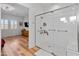 Modern bathroom with a large walk-in shower and a view of bedroom at 11899 N Spearfish St, Surprise, AZ 85388