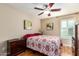 Charming bedroom with wood floors and ceiling fan at 21836 W Hopi St, Buckeye, AZ 85326