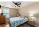 Serene bedroom with ceiling fan and window shutters at 21836 W Hopi St, Buckeye, AZ 85326