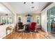 Casual living area with hardwood floors and sliding glass doors at 21836 W Hopi St, Buckeye, AZ 85326