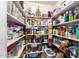 Well-stocked pantry with ample shelving for storage at 21836 W Hopi St, Buckeye, AZ 85326