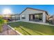 Landscaped backyard with patio and gazebo at 28965 N 120Th Dr, Peoria, AZ 85383