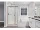 Modern bathroom with soaking tub and walk-in shower at 28965 N 120Th Dr, Peoria, AZ 85383