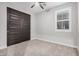 Spacious bedroom with carpet and double doors at 28965 N 120Th Dr, Peoria, AZ 85383