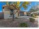 Single-story home with stone accents and a two-car garage at 28965 N 120Th Dr, Peoria, AZ 85383