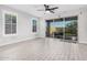 Bright living room with tile floors and sliding glass doors at 28965 N 120Th Dr, Peoria, AZ 85383