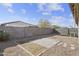 Backyard with gravel, patio, and block wall at 40925 W Patricia Ln, Maricopa, AZ 85138