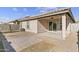 Backyard with patio, gravel, and AC unit at 40925 W Patricia Ln, Maricopa, AZ 85138