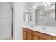 Bathroom with double vanity and a separate toilet at 40925 W Patricia Ln, Maricopa, AZ 85138
