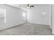 Spacious bedroom with two windows and carpet at 40925 W Patricia Ln, Maricopa, AZ 85138