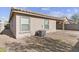 House exterior with stucco siding and landscaping at 40925 W Patricia Ln, Maricopa, AZ 85138